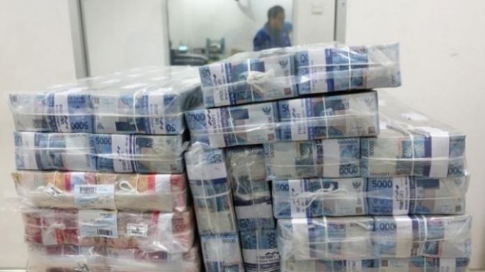 Tumpukan Uang Mainan Mujiono