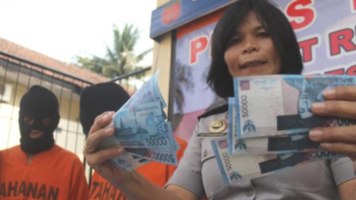 Polisi Berhasil Membongkar SIndikat Pengedar Uang Palsu