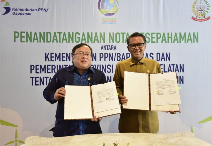 Gubernur Sulsel Nurdin Abdullah bersama Menteri PPN Bambang Brodjonegoro.