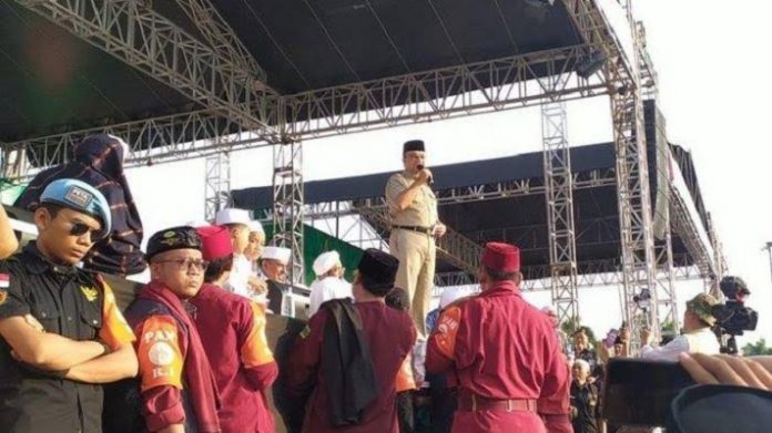 Gubernur DKI Jakarta Anies Baswedan menyampaikan sambutan pada Reuni Mujahid 212.