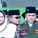Erick Thohir pakai baju Banser di acara puncak Peringatan 1 Abad Nahdlatul Ulama, di Sidoarjo, Selasa (7/2/2023)