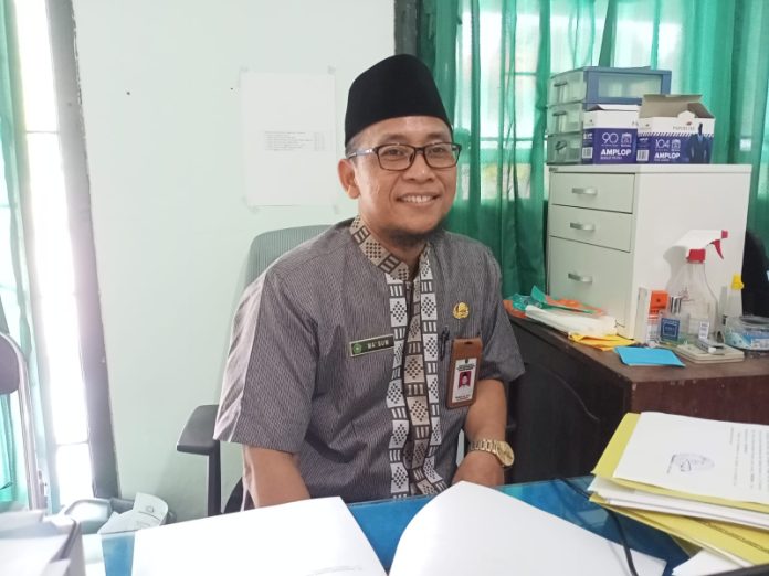 Ma'sum penyelenggara zakat dan wakaf kemenag kabupaten Mojokerto. Foto : Fio Atmaja