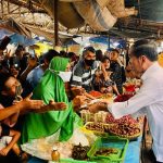 Presiden Jokowi Kunjungi Pasar Natar Lampung Tinjau Harga Komoditas Pangan.