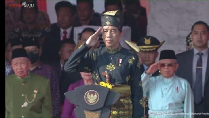 Presiden Jokowi Kenakan Pakaian Adat Kesultanan Deli