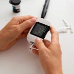 high-angle-diabetic-woman-checking-her-glucose-level_23-2150756373