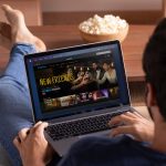 man-watching-streaming-service-his-laptop_23-2149047430